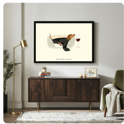 Large framed canvas of a sleeping dachshund with wine glass displayed above a dark walnut sideboard in a stylish living room with gold floor lamp