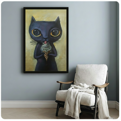 Black framed surreal dark cat licking frog ice cream cone art print with golden eyes on a light blue-grey wall beside a linen armchair with draped throw