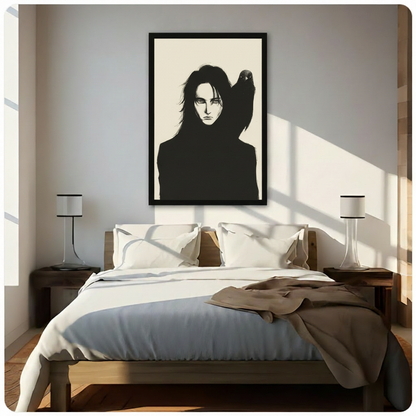Dark gothic ink illustration of a mysterious long-haired figure in black with a raven perched on one shoulder on an ivory background gothic wall art framed print above bedroom with white bedding and dark wood bedside tables