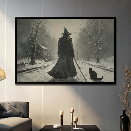 Dark witch and black cat snowy forest wall art held in a black frame by hand