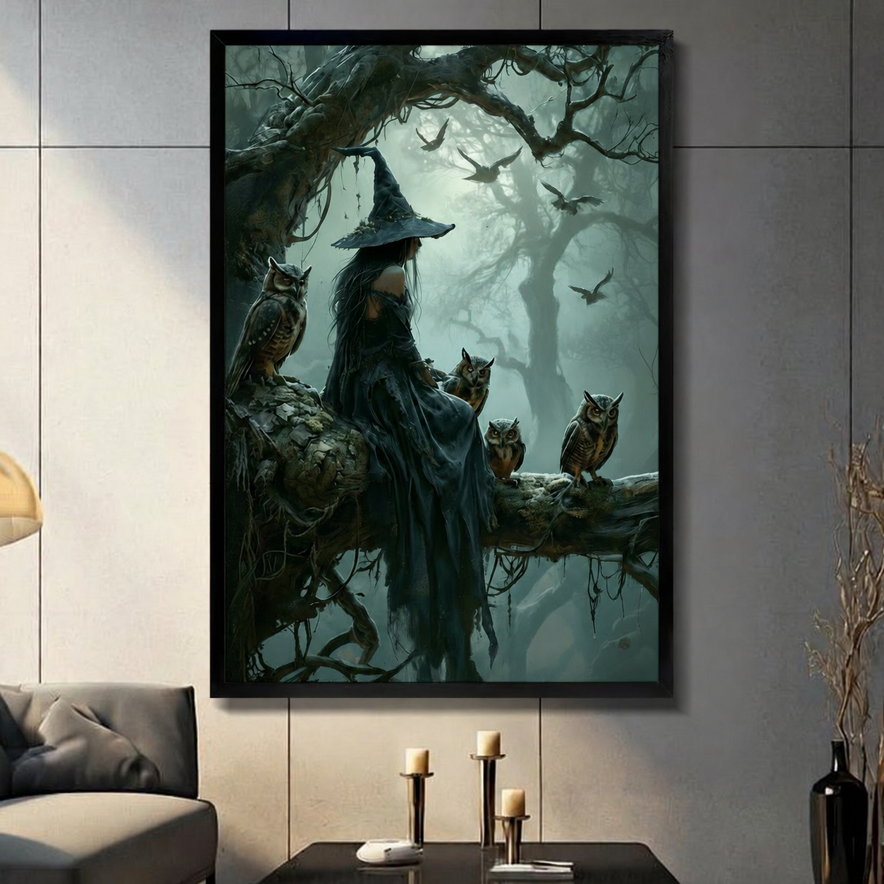Framed dark witch with owls in misty forest fantasy canvas wall art displayed in modern living room with grey paneled wall and candlestick console decor