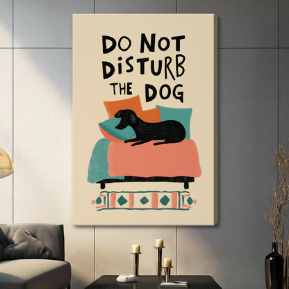Do Not Disturb The Dog stretched canvas print hung on a grey wall in a contemporary living room setting