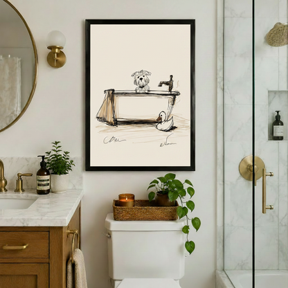 Black framed dog bathtub sketch wall art print in luxury bathroom with gold fixtures marble vanity and glass shower