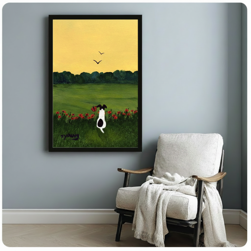 Framed black and white dog in red poppy field wall art on blue-gray wall beside white armchair with throw blanket