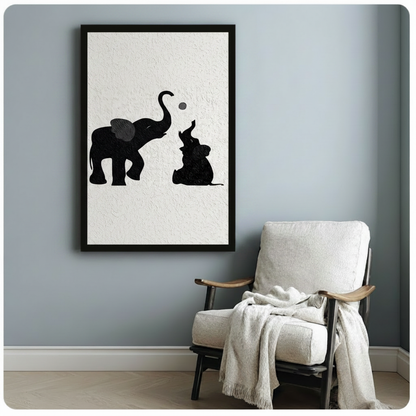Framed black and white elephant wall art print with textured brushstroke detail, styled above a linen armchair in a soft blue-grey interior