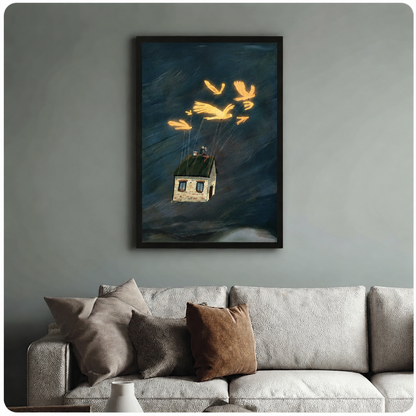 Whimsical framed wall art print of glowing birds tethered to a drifting house above stormy waters, styled above a neutral linen sofa