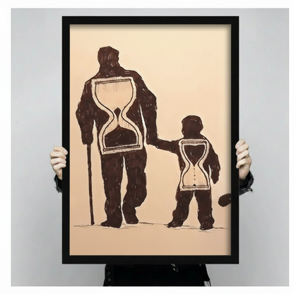 Father and child hourglass wall art in black frame held in hands, showing print size and fine art quality