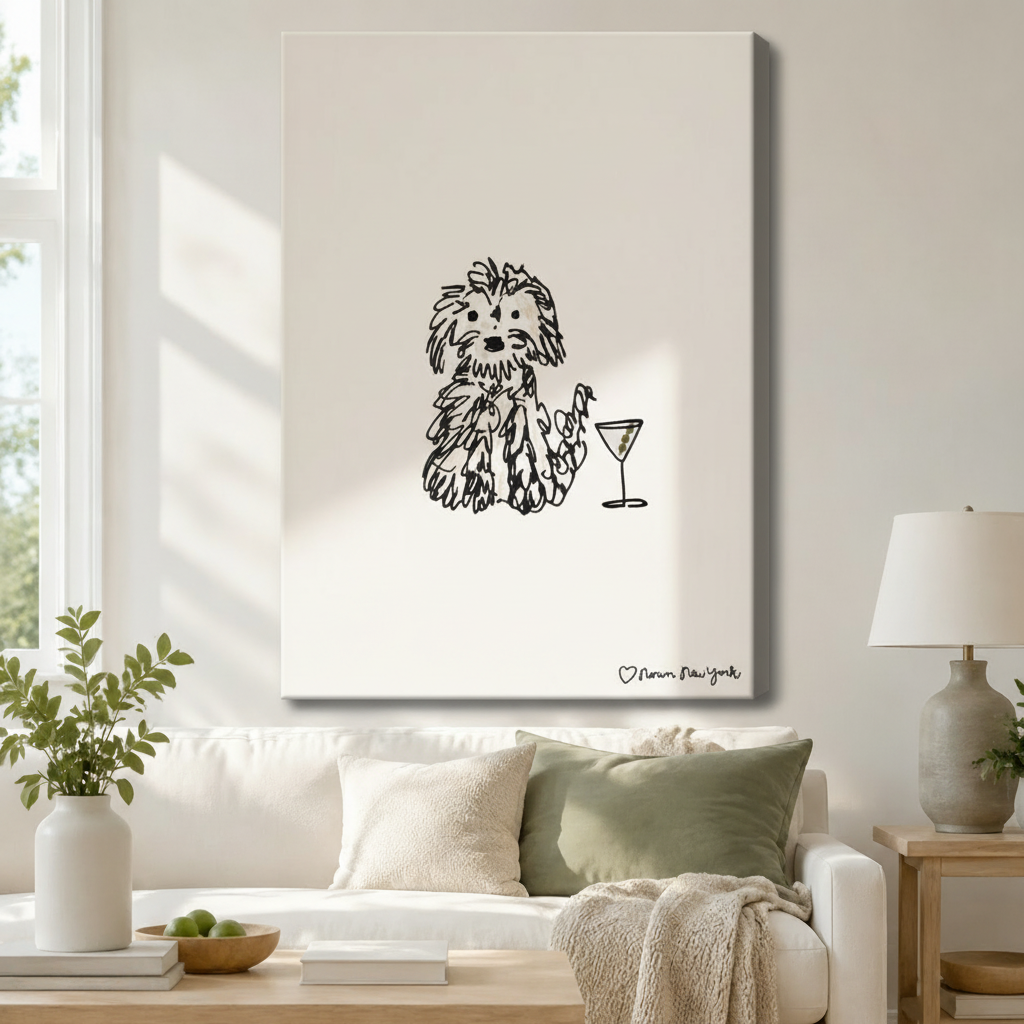 Gallery wrapped canvas of minimalist dog and martini glass ink sketch displayed above white sofa in airy Scandinavian living room