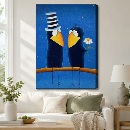 Stretched canvas wall art of a charming folk art romantic crow couple print featuring two round dark navy blue cartoon crows sitting together on a warm amber branch gazing at each other tenderly, one wearing a tall black and white striped stovepipe top hat and the other clutching a single white daisy, both with broad golden yellow beaks and white eye rings on a deep cobalt blue night sky background dotted with tiny gold sparkles, hung above a white sofa with a sage green pillow and cream throw in a bright a