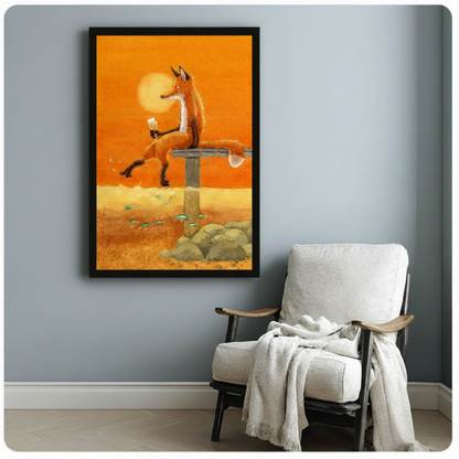 Storybook fox on dock with ice cream and fishing line on warm orange background, black framed canvas print hung on muted blue-gray wall beside white linen armchair