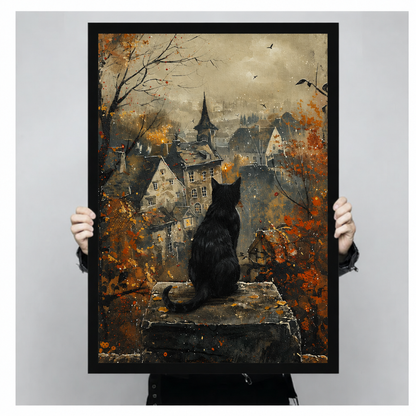  Framed black cat autumn town canvas wall art held by hands, depicting a cat facing a distant village among fall leaves