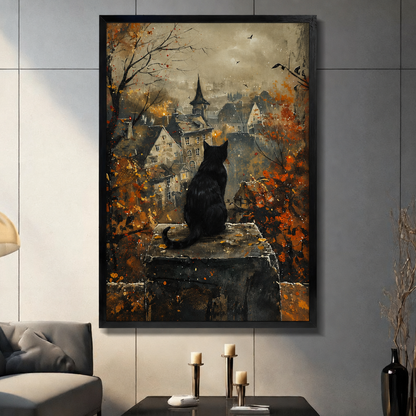 Framed black cat autumn town canvas wall art displayed in a living room, with a cat overlooking a village through fall foliage
