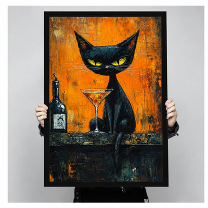 Framed black cat cocktail canvas wall art held by hands, featuring a cat beside a martini glass and bottle