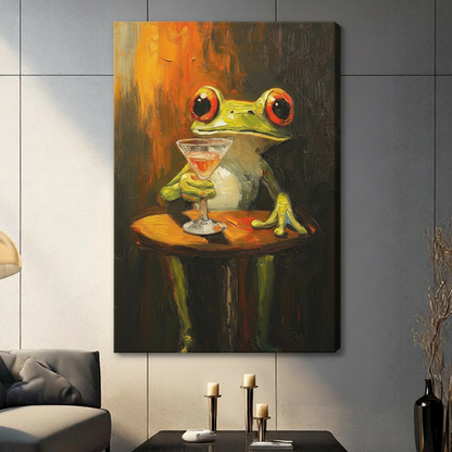Framed frog wall art showing a whimsical green frog enjoying a cocktail at a table
