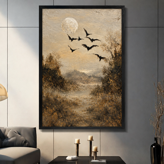 Framed Halloween bat canvas wall art displayed in a living room, with bats flying beneath a full moon over an autumn path