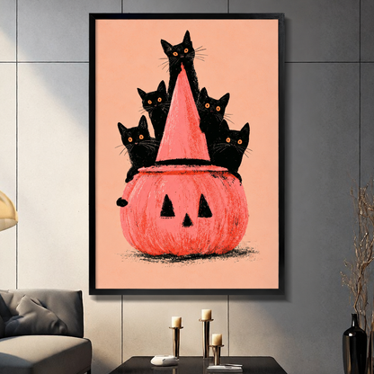 Black-framed cat and pumpkin Halloween artwork on a paneled living room wall above decorative candles.