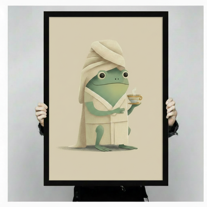 Person holding framed frog in bathrobe wall art print – spa-inspired whimsical poster