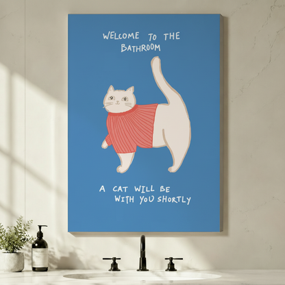 Unframed funny whimsical illustration round white cat in coral pink knit turtleneck sweater tail pointing upward with playful handwritten typography Welcome To The Bathroom A Cat Will Be With You Shortly on cornflower blue background canvas print on light grey wall above black faucet bathroom vanity with pump soap bottle and potted plant - witty bathroom cat sweater welcome wall art for modern powder room decor