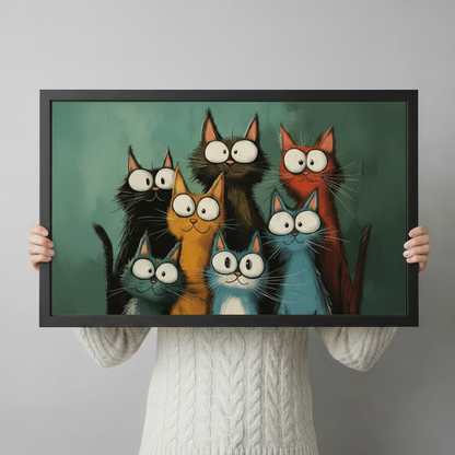Person holding large black framed funny colorful big-eyed cartoon cats group portrait horizontal print showing artwork size and scale