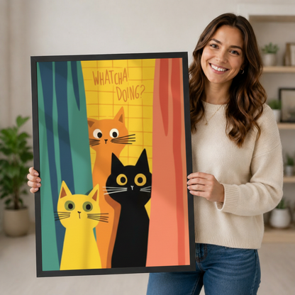 Smiling woman holding a large black framed funny cats Whatcha Doing canvas art print with three wide-eyed cartoon cats — orange, yellow, and black — peeking curiously through bold teal yellow and coral retro-style curtains