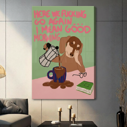 Stretched canvas wall art of a humorous half-asleep brown dachshund pouring overflowing coffee into a striped blue mug with a sarcastic good morning quote in pink hand-lettering on a color-blocked green and pink background, hung on a dark gray tile wall beside a modern gray sofa with candlestick decor