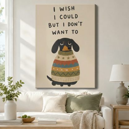 Stretched canvas funny dachshund I Wish I Could But I Don't Want To wall art featuring a sulky black dachshund in a multicolor knit sweater on a warm beige background, hung above a white sofa with sage green pillows in a bright living room