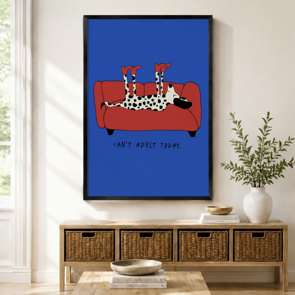 Black framed Dalmatian sofa art print in cobalt blue hanging above a rattan sideboard with wicker baskets in a bright natural light living room