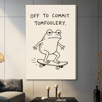 Unframed stretched canvas print of a round deadpan frog with glasses skating on a skateboard and the witty quote Off To Commit Tomfoolery in black handwritten lettering on a warm cream background in minimalist line art illustration style