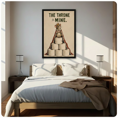 Framed vintage humorous illustration regal mouse with gold crown and red royal mantle perched on stacked toilet paper rolls with bold typography The Throne Is Mine on distressed beige background canvas print above dark walnut bed with white linen in sunlit minimalist bedroom with twin slim table lamps - witty bathroom king mouse toilet paper wall art for contemporary bedroom decor