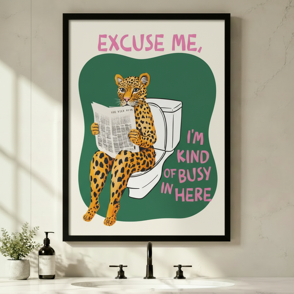 Funny leopard reading newspaper on toilet framed canvas wall art, displayed above a modern bathroom sink with black faucets, green plants, and soap dispensers