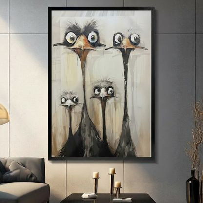 Framed funny ostrich family canvas wall art featuring four wide-eyed long-necked ostriches in expressive oil painting style with beige textured background displayed on a dark grey slate wall in a modern living room