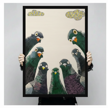 Person holding a large black framed funny pigeon flock canvas art print featuring seven bold expressive birds staring upward with whimsical patterned clouds against a light gray background