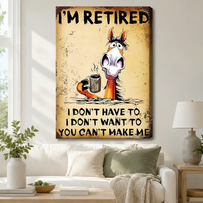 Stretched canvas wall art of a hilarious retro grunge funny retired horse coffee print featuring bold I'm Retired text above a bug-eyed cartoon horse with a wild mane emerging from the ground holding a steaming metal coffee mug with the humorous retirement quote I Don't Have To I Don't Want To You Can't Make Me on a distressed aged amber rust-mottled background, hung above a white sofa with a sage green pillow and cream throw in a bright airy living room with a round wood coffee table, a white ceramic table