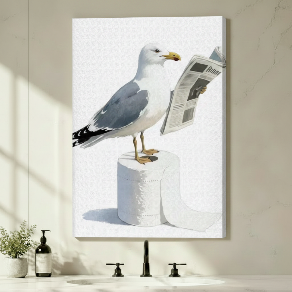 Humorous seagull on toilet paper rolls reading a newspaper gallery wrapped canvas wall art hung above a modern bathroom vanity with black fixtures soap dispenser and green plant