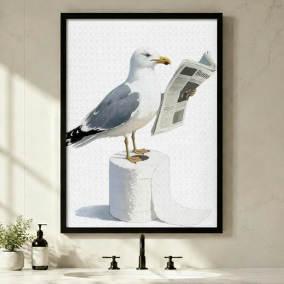 Funny seagull reading a newspaper while standing on toilet paper rolls framed wall art print above a bathroom sink with black faucet soap dispenser and small potted plant