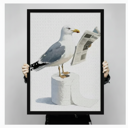 Person holding a large framed funny seagull reading a newspaper print standing on toilet paper rolls humorous coastal bird bathroom wall art on a light gray background