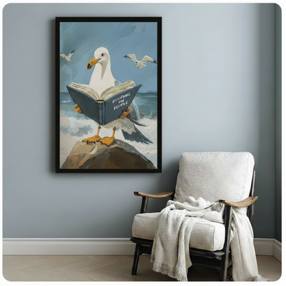 Funny seagull reading book black framed canvas art on blue-gray wall beside white upholstered armchair with throw blanket