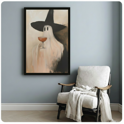 Ghost witch wall art mounted on a blue-gray wall beside a white accent chair and throw blanket.
