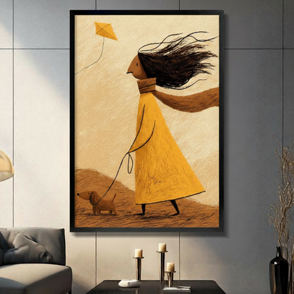 Framed wall art print of a whimsical girl in a yellow dress walking a dachshund and flying a kite in the wind, displayed in a modern living room above a console table with candles