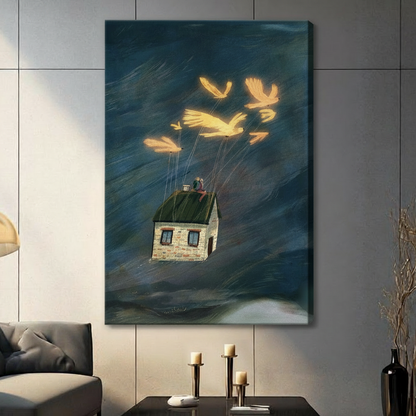 Gallery-wrapped canvas of luminous golden birds carrying a floating stone cottage over a dark ocean, hung in a contemporary living space