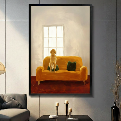 Golden retriever standing on yellow sofa gazing out window — framed canvas art on grey panel wall with candle decor