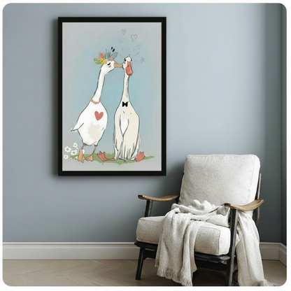 Charming illustrated goose couple wall art in black frame beside linen armchair, soft blue romantic print with heart and daisy details