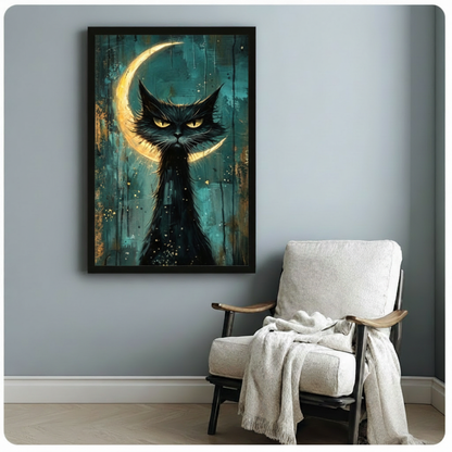 Black framed gothic black cat with crescent moon canvas art showing a brooding wild-furred black cat with intense golden eyes backed by a glowing golden crescent moon on a moody layered teal and dark amber drip-painted background with scattered gold star flecks, displayed beside a white linen wood-frame armchair with a cream throw