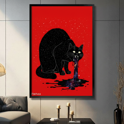 Black framed gothic black cat vomiting galaxy canvas art with a large hunched star-filled black cat with glowing yellow-green eyes and bared fangs dripping a swirling purple blue galaxy stream onto a black ink splatter puddle against a vivid red background with scattered gold star flecks signed Machuca, hung on a gray panel wall above a dark gray sofa