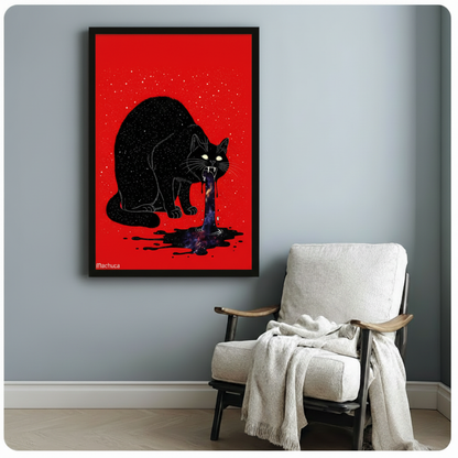 Black framed gothic black cat vomiting galaxy canvas art showing a crouching star-speckled black cat with piercing yellow-green eyes and bared fangs releasing a dripping swirling purple blue galaxy vortex onto a black ink splatter on a vivid red background with gold star flecks signed Machuca, displayed beside a white linen folding chair with a cream throw