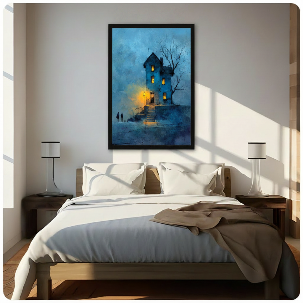 Large framed gothic blue tower house wall art above bed, depicting misty stone building with golden lantern glow, leafless tree, and silhouetted figures in atmospheric oil painting, in sunlit neutral bedroom