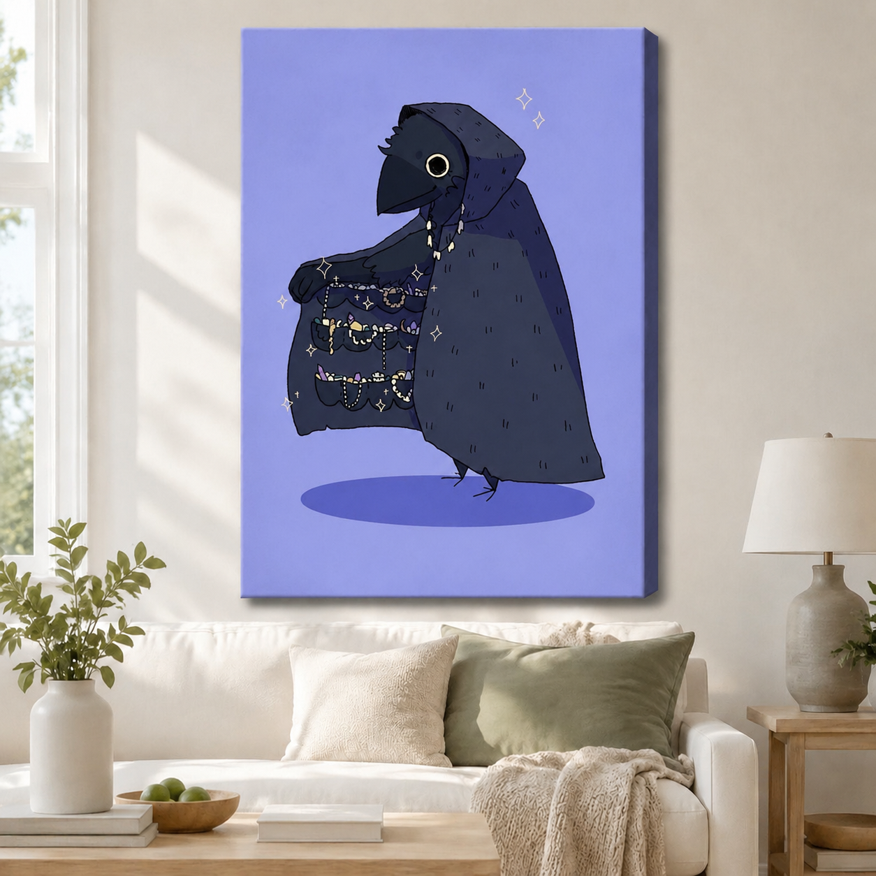 Canvas wall art of a mysterious hooded crow with a jewel-lined cloak on a periwinkle background, displayed above a white linen sofa in a bright neutral living room