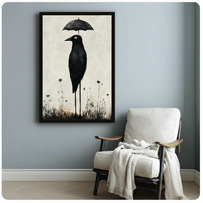 Black framed art poster of a quirky gothic crow with an umbrella and wild meadow flowers in a moody ink illustration style, styled beside a white linen armchair on a blue-gray wall