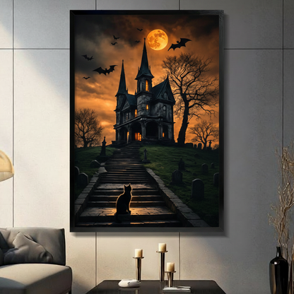 Gothic haunted house framed wall art print featuring a black cat on moonlit stairs with bats flying over a Victorian mansion, displayed in a dark moody living room