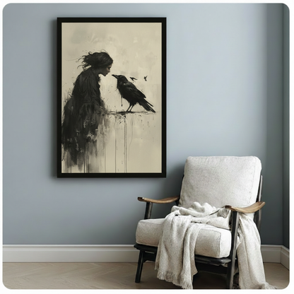 Framed gothic woman raven canvas art beside linen armchair on blue-gray wall — mysterious dark academic ink illustration for moody and witchcore home decor